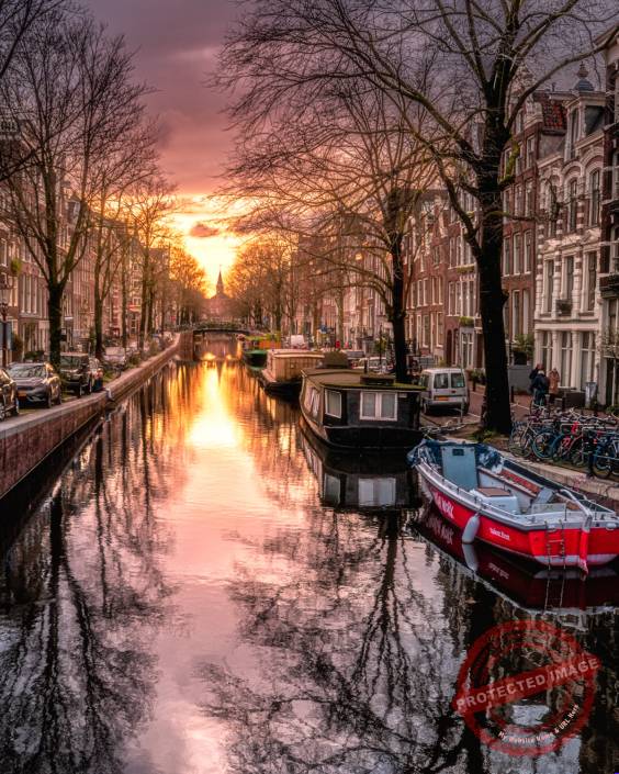 Amsterdam canal at sunset